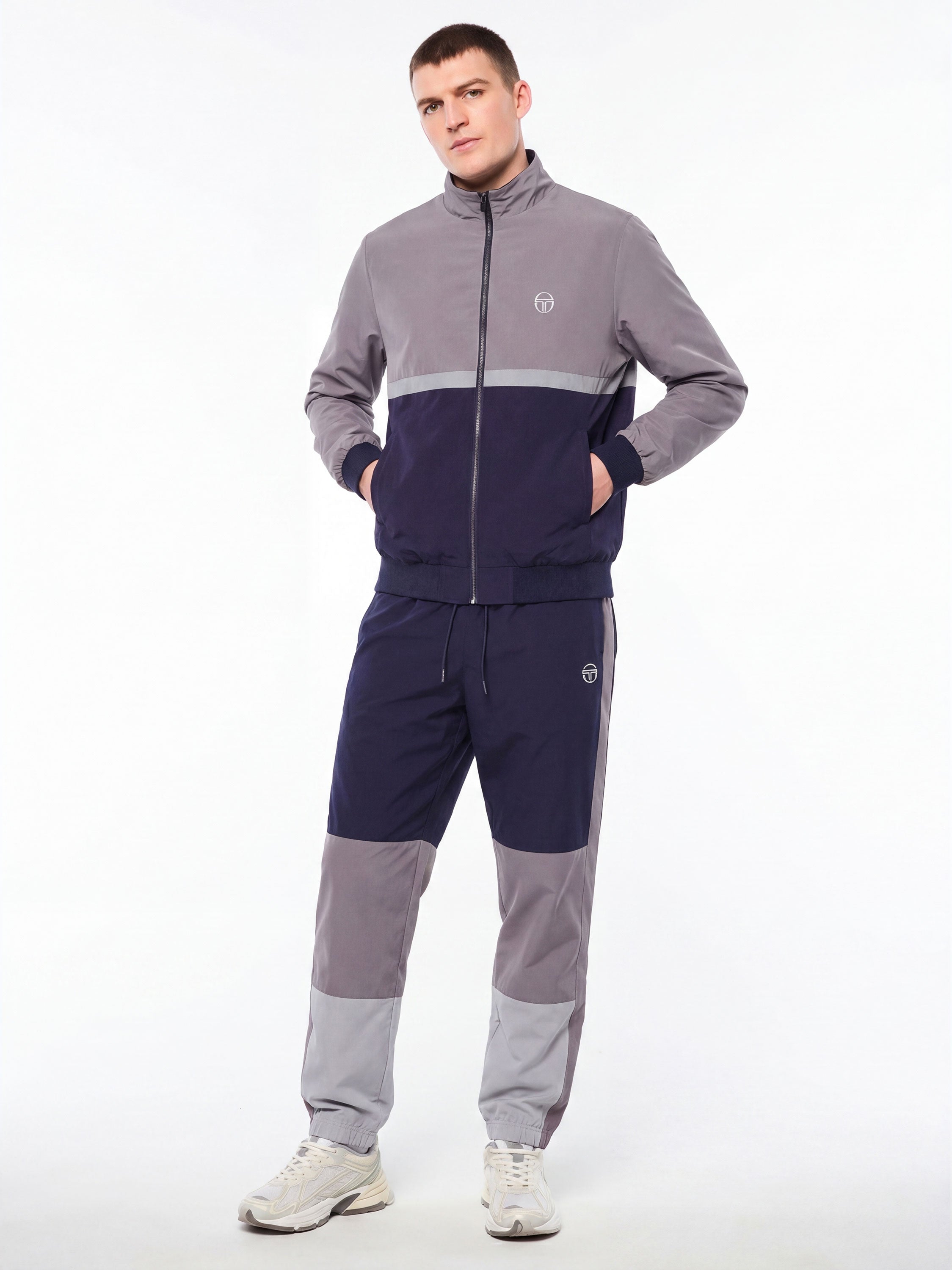 Model wearing Portico Track Jacket