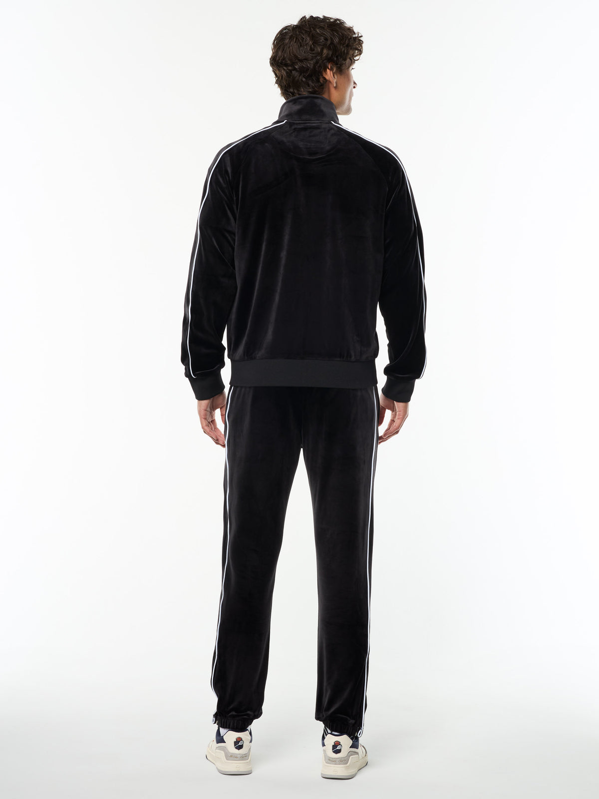 Full body back view of the Lioni Velour Track Jacket and matching pants in Black Beauty.