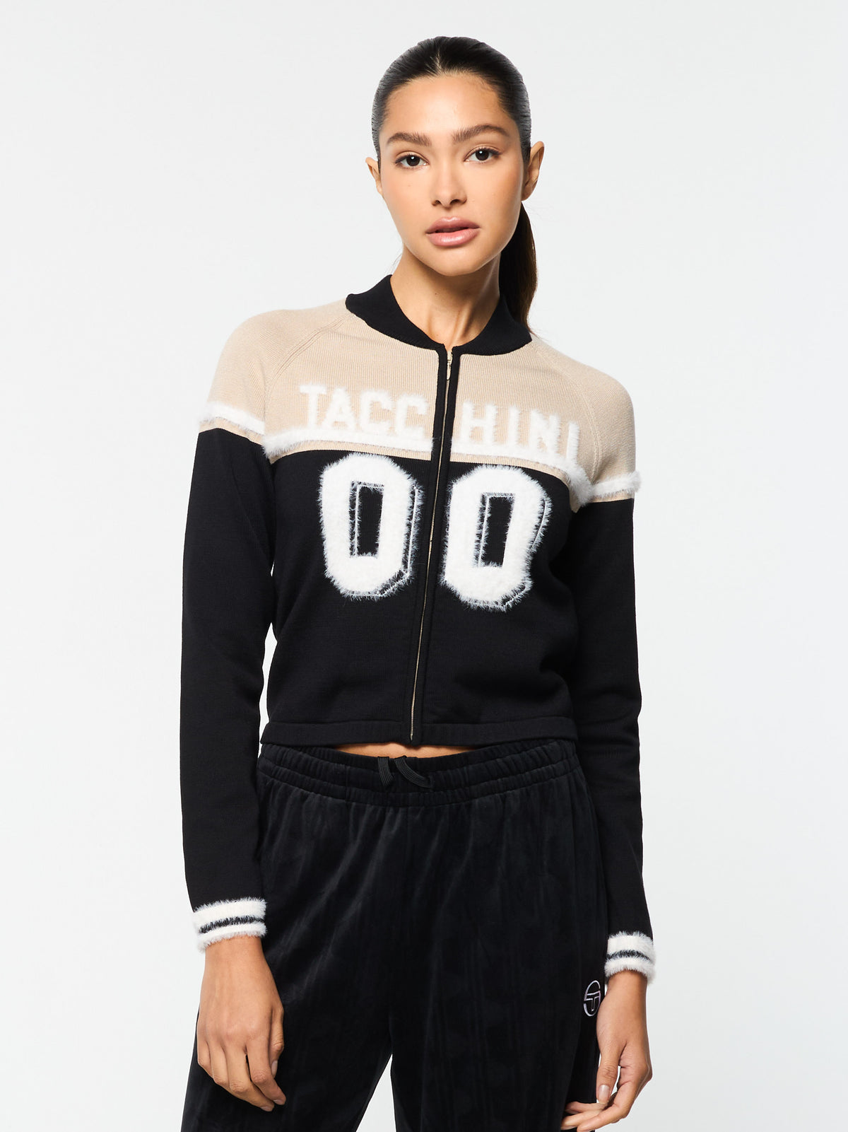 Ruota Cycling Jersey in Black Beauty, front view with "Tacchini 00" varsity graphic.