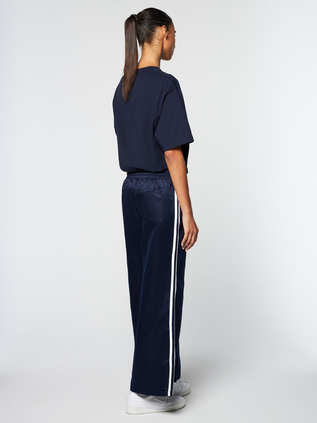 Back three-quarter view of the Miss Stella Pants in Maritime Blue on model.