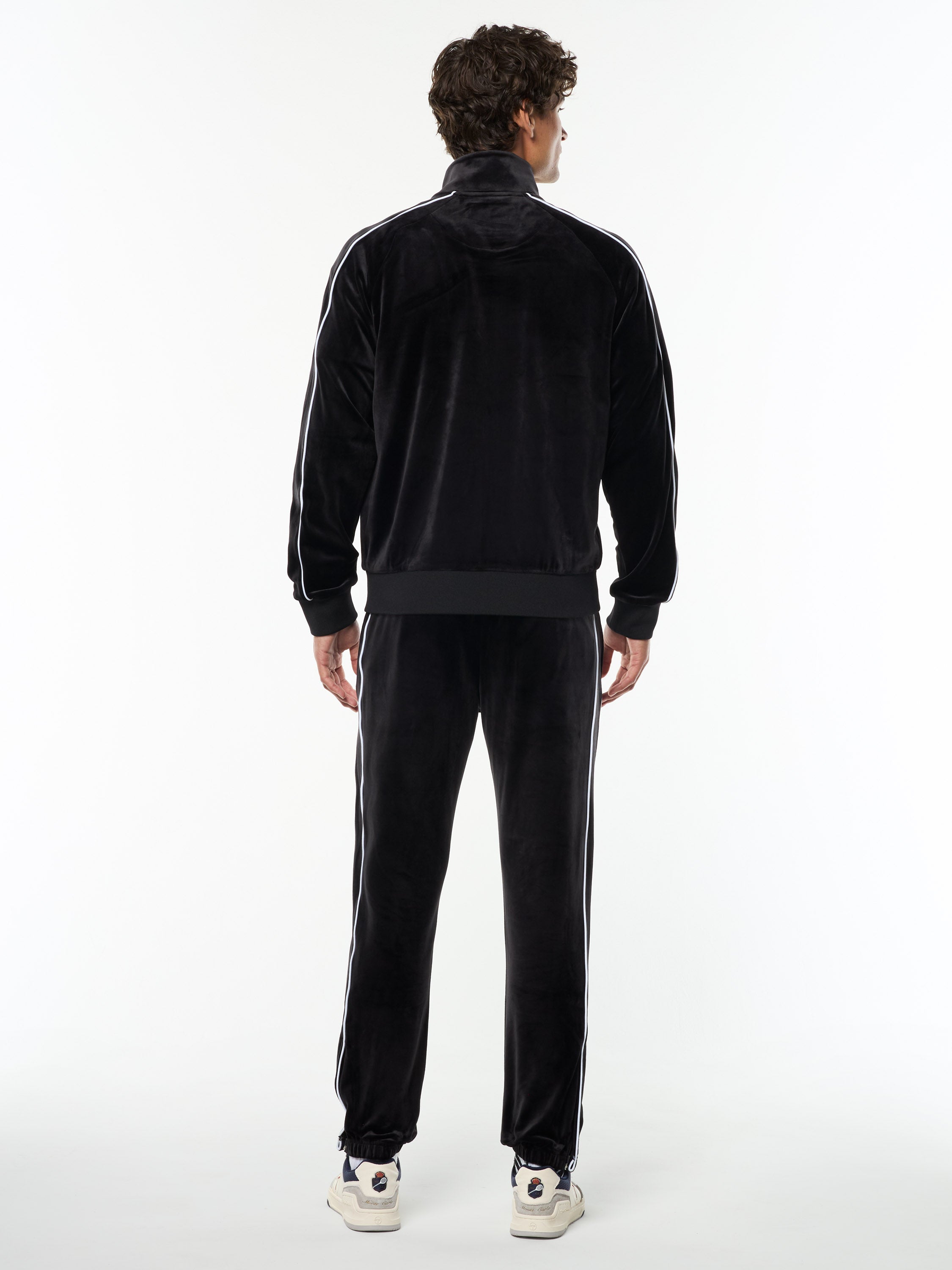 Full body back view of the Lioni Velour Track Jacket and matching pants in Black Beauty.